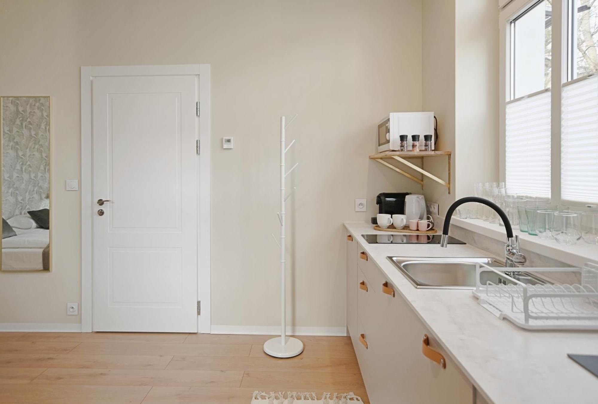 Victus Apartamenty, Compassi